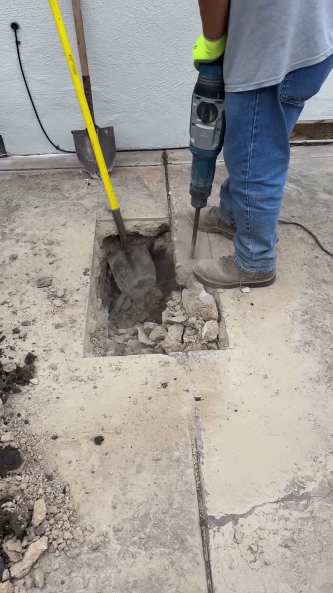 Plumber repairing sewer clean-out access inside a home crawl space — Power Plumbing USA