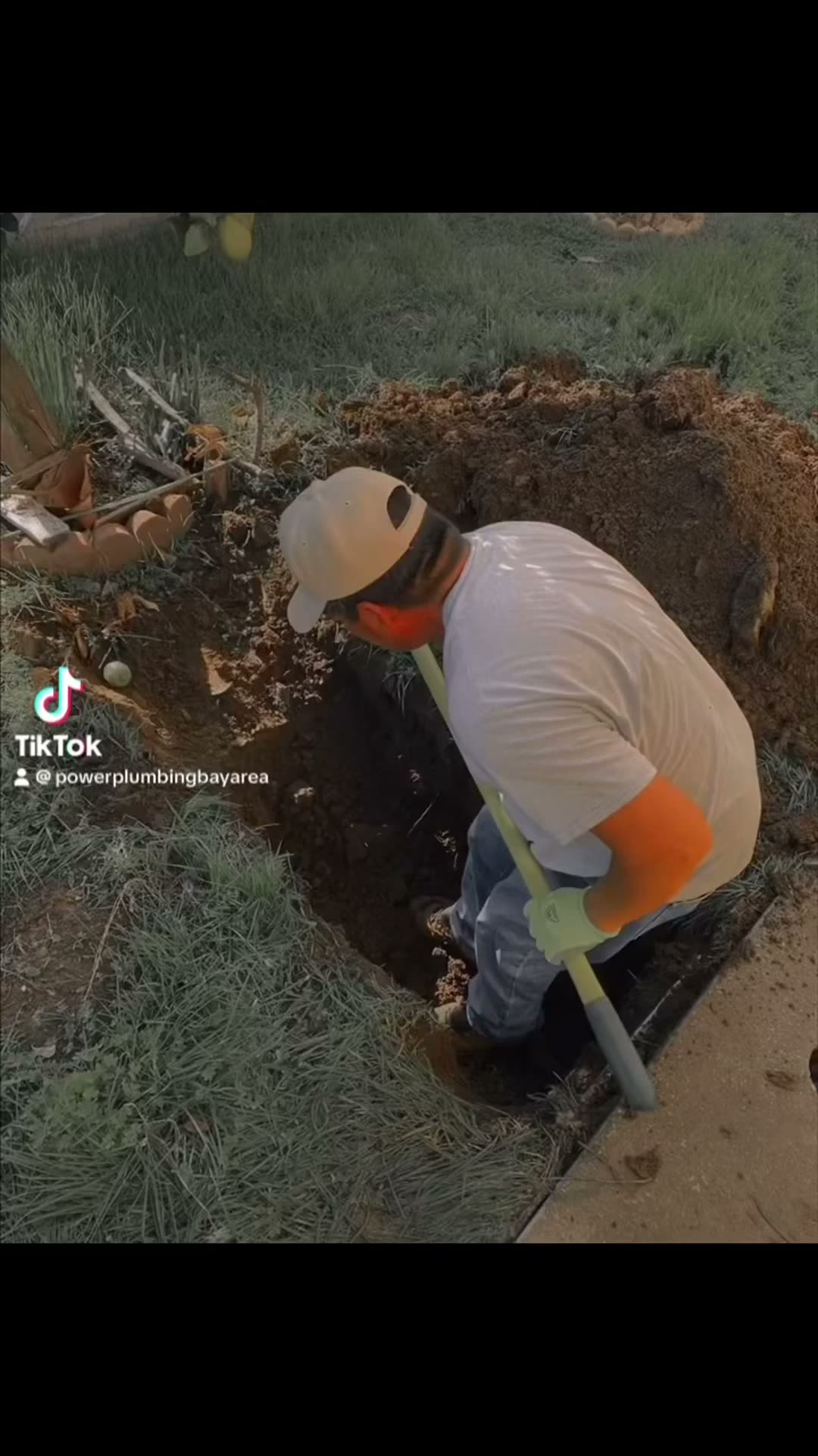 Bay Area plumber installing a new sewer clean-out in a front yard trench — Power Plumbing USA